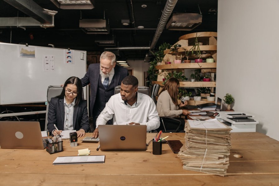 four-people-working-in-the-office