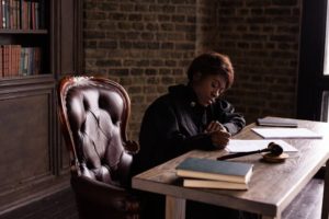 a female judge sitting in her judge’s chamber