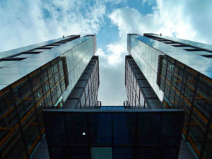 two-sky-touching-building