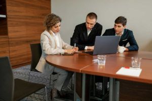 people-in-an-office-having-a-meeting