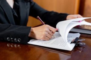 women-writing-on-a-paper