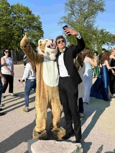 William's sense of humor on display and undercover as a tiger mascot.