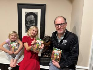Jonathan-Charlotte-and-Clara-White-with-their-children’s-book,-My-Day-with-Abe-Lincoln-in-February-2024.