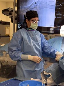 Vascular-surgeon-Lily-Johnston-focused-while-performing-surgery.