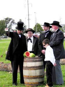 ron-as-abe-christening-city